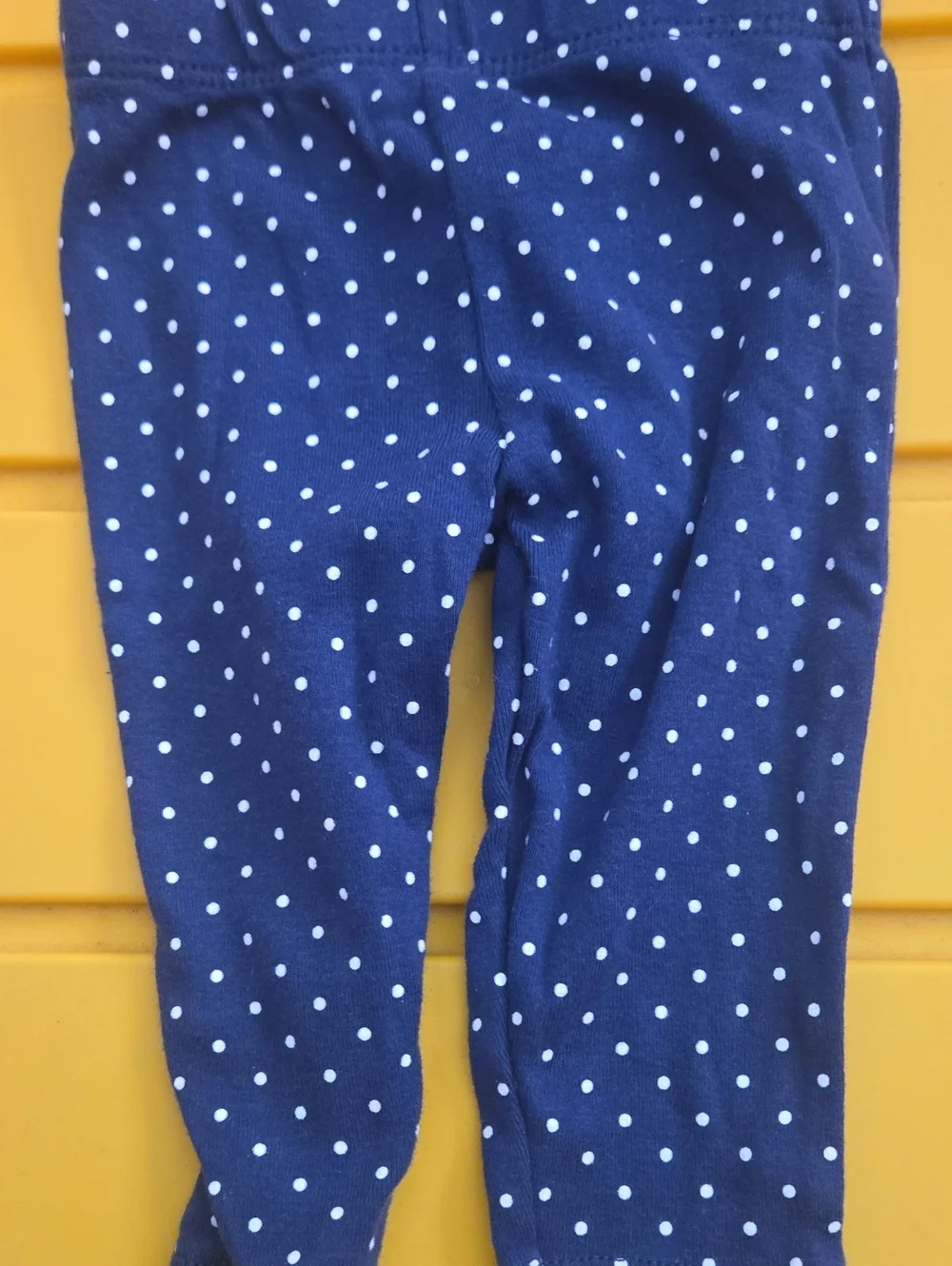 Carter's Onesie with polka dots and matching leggings.
